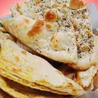 Naan Platter- (Garlic,Onion,Butter,Paneer,Aloo,Methi)